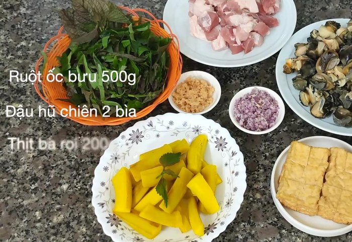 Sơ chế ốc bươu: Làm sạch và để ráo nước. (45.48)